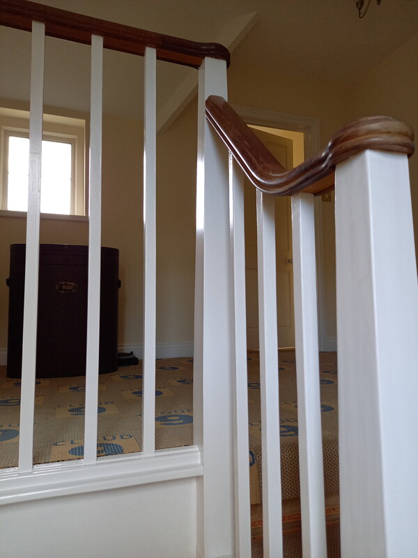 Freshly-painted white banisters.
